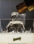 1981 What a surprise that out of this warm amber bottle, the clear white essence of orange tumbles over ice. Cointreau