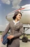 1961 Aeroflot flight attendant after the flight. Photo by Georgy Petrusov, Vnukovo airport, Moscow, USSR