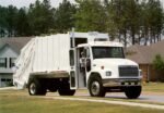 1999 Freightliner FL 70 Stand-Up RHD Refuse Truck